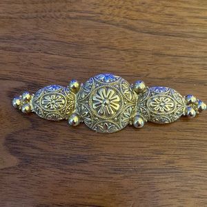 Vintage 1928 gold filagree brooch
